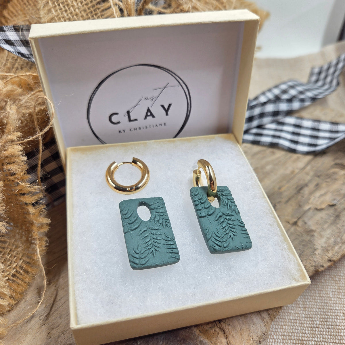 Chunky Hoops with green fern charm